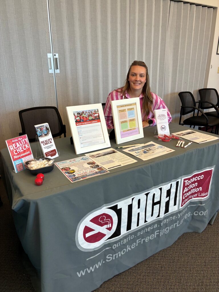 Hali Rockow represents TACFL and the Reality Check program at a school nurse snack and chat event in Ontario County.